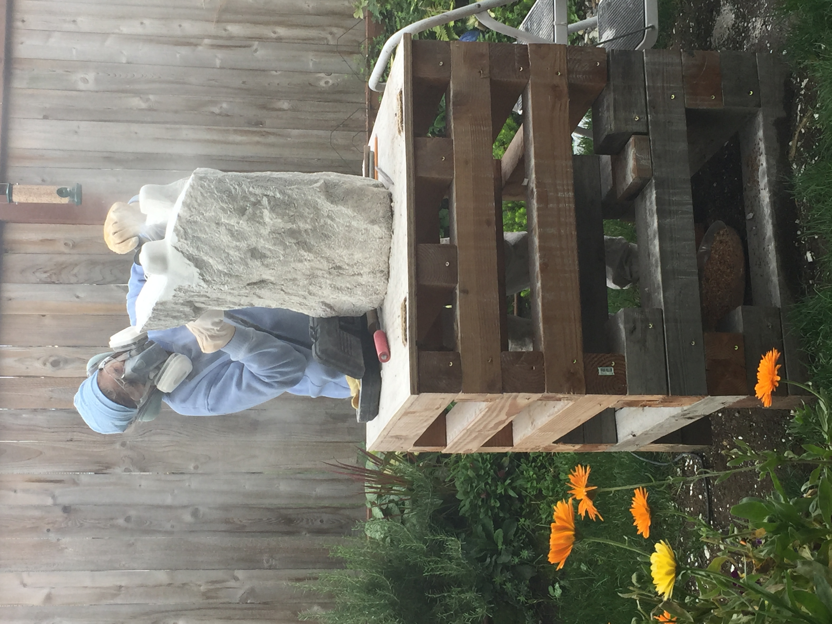 LeeAnn Seaburg Perry carving stone in her studio